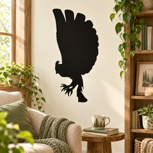 Black horned owl silhouette decal with extended wings and talons
