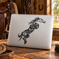 Leaping horse swirl decal on white laptop lid