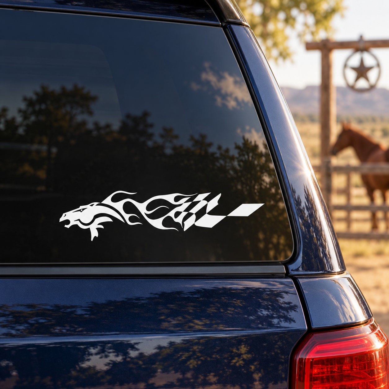 White horse head and flame trail decal on car window glass