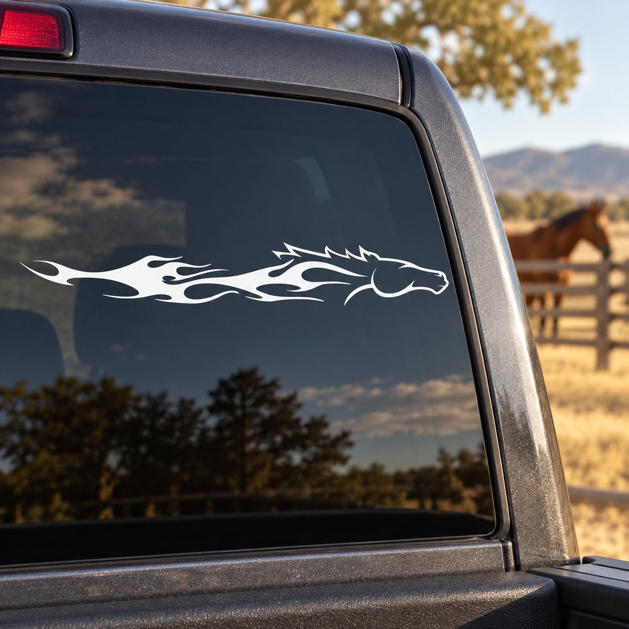 Horse head flame burst decal for car window, white graphic on dark glass