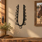 Horse bell decal: black ornate horseshoe with bell and scroll design