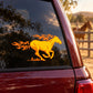 Golden fiery horse sticker with flame mane and tail on black background