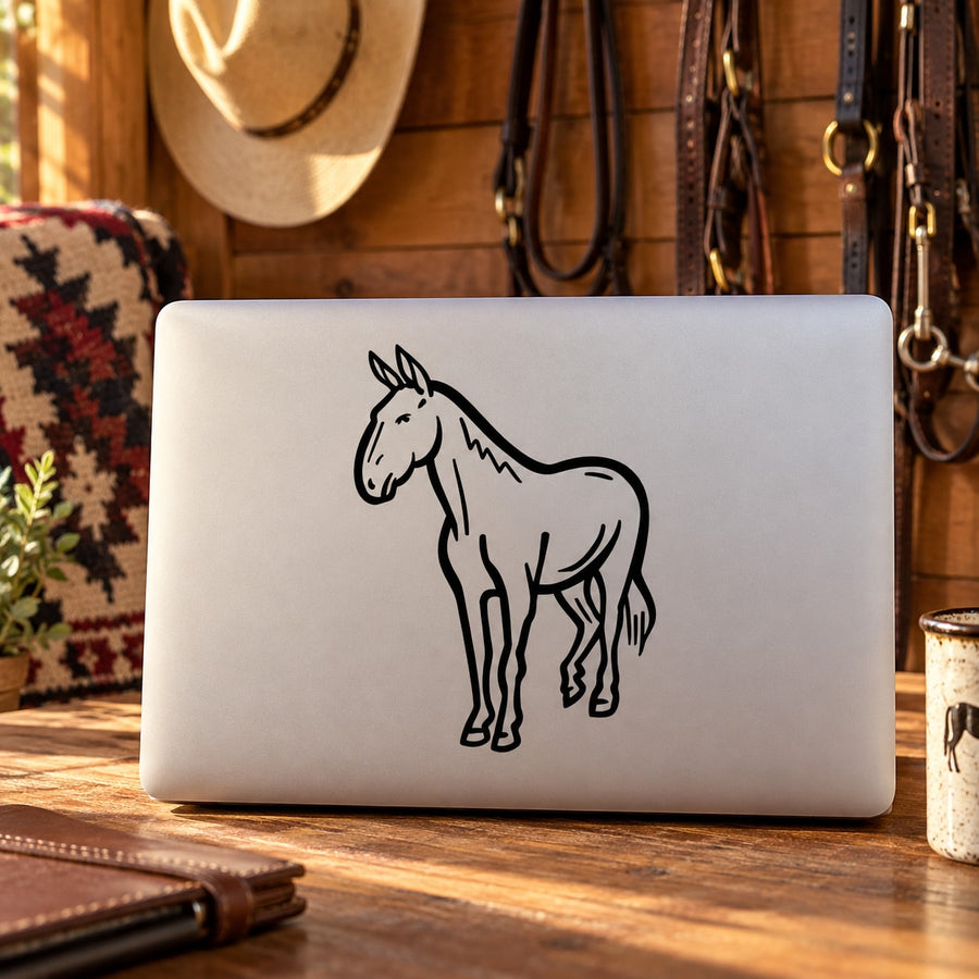 Horse decal with black outline on a white rectangular sheet