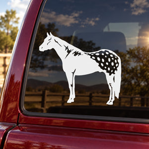 White standing horse decal with speckled coat on car window