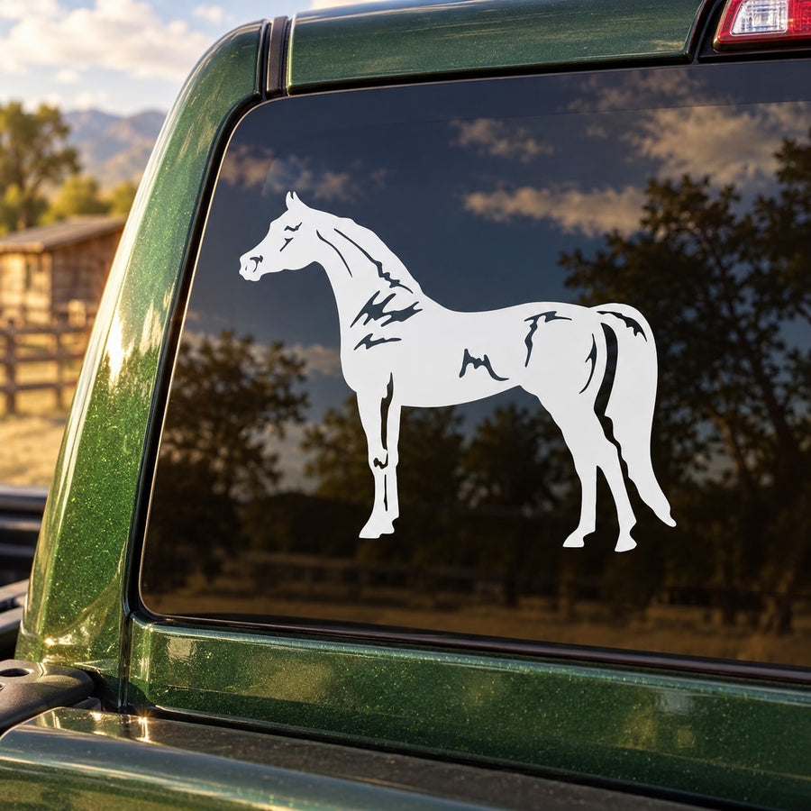 Standing stallion decal, white horse silhouette on dark vehicle window