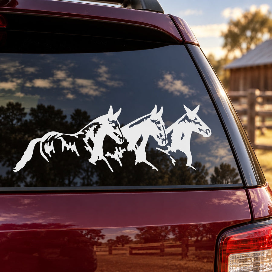 Three Horses decal sticker with white horse silhouettes on car window