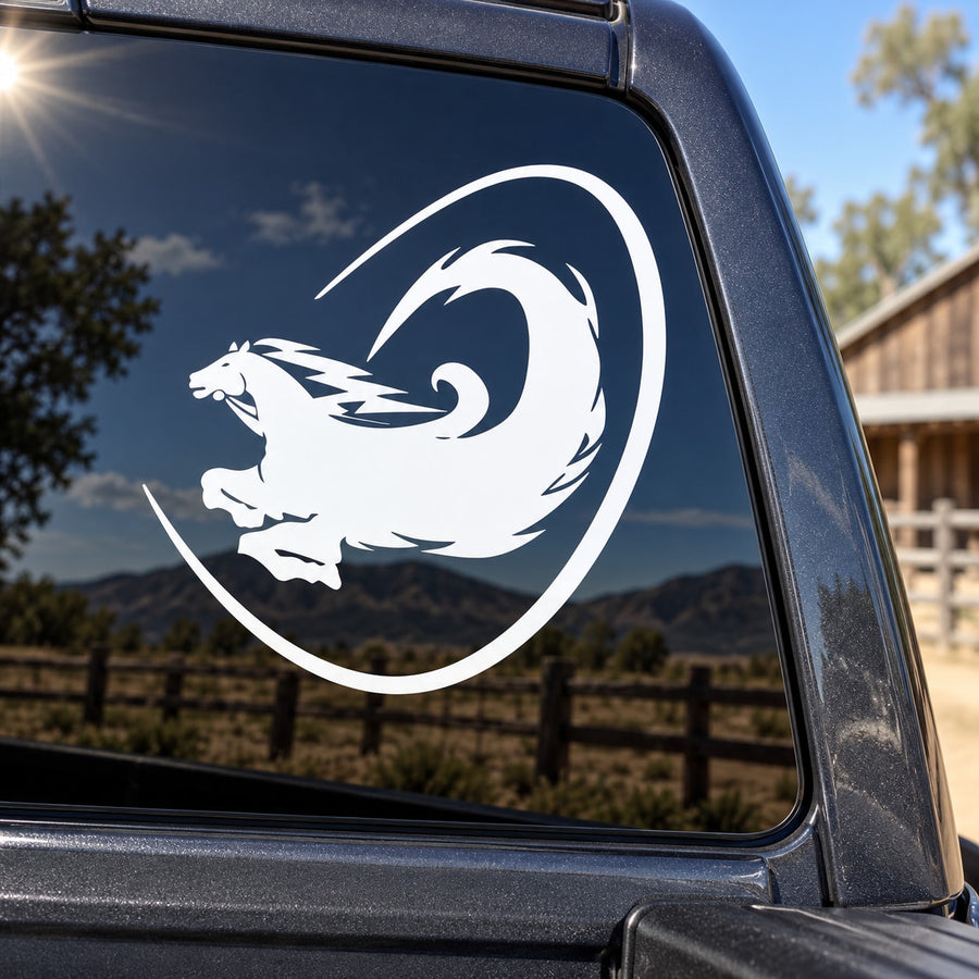 White stylized flaming horse decal in heart outline on vehicle window
