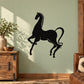 Black horse silhouette wall decal with curly mane and flowing tail
