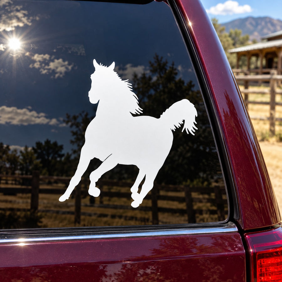 Turning stallion decal, white horse silhouette on a car window
