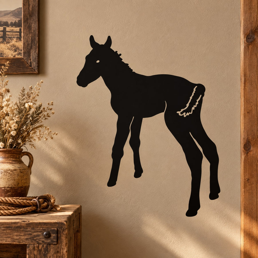 Black foal wagging tail decal featuring a standing horse silhouette