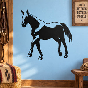 Trotting stallion decal: black trotting horse silhouette on light blue surface.