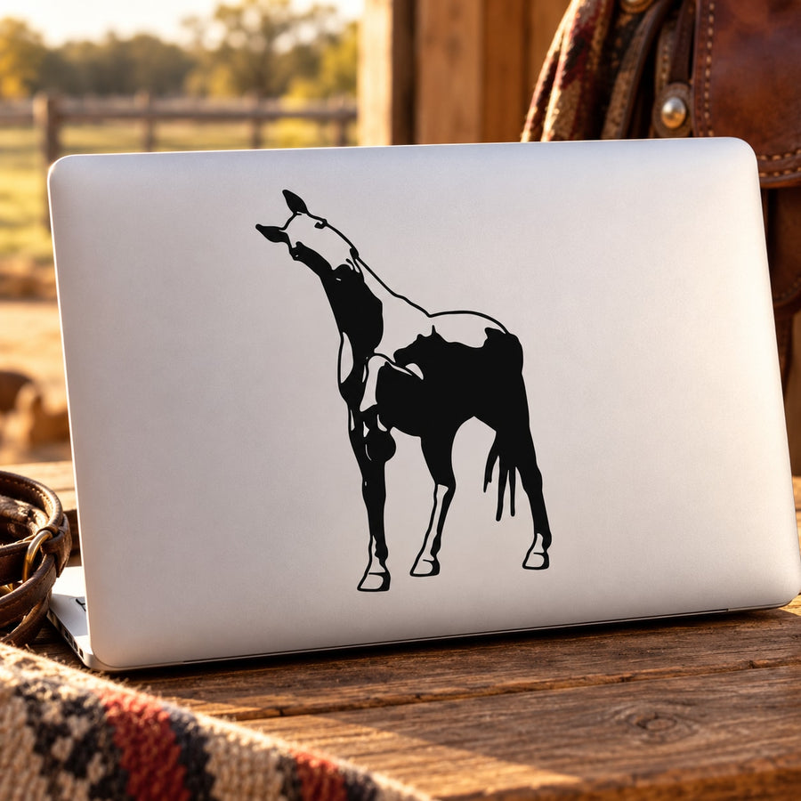 Horse silhouette decal showing a curious horse approaching on a white laptop lid
