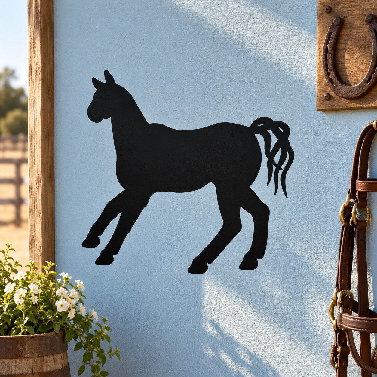 Horse silhouette decal, black horse on light blue surface