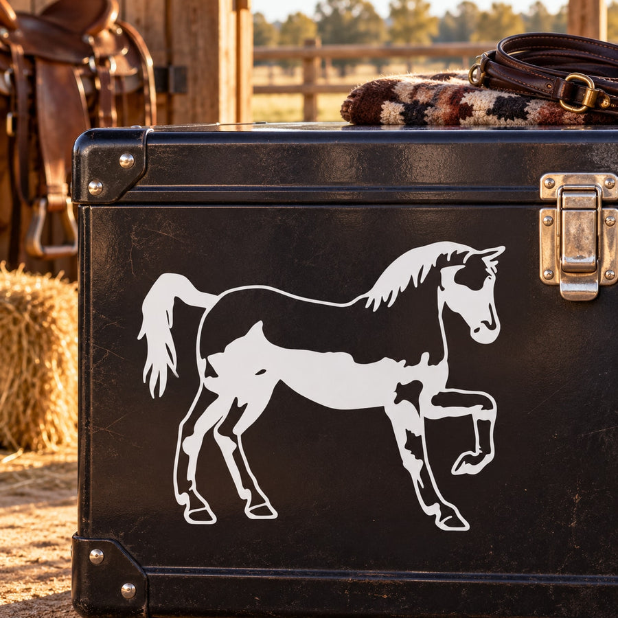 Horse decal on black metal suitcase, white side graphic of rearing horse