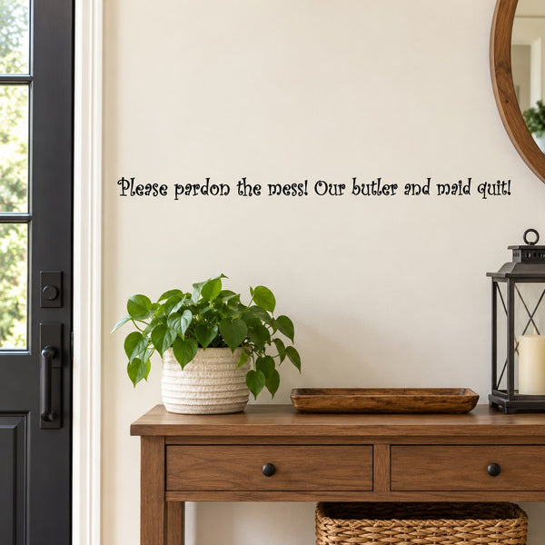 Wall decal with quote: “Please pardon the mess! Our butler and maid quit!”