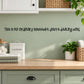 Wall decal with humorous quote: “This is no ordinary housewife you’re dealing with”.