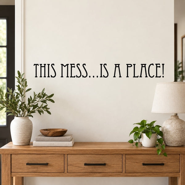 Wall decal reading “THIS MESS…IS A PLACE!” black lettering