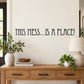 Wall decal reading “THIS MESS…IS A PLACE!” black lettering