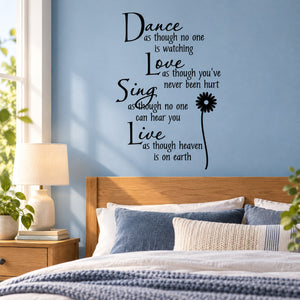 Inspirational wall decal with black script quote and small flower accent