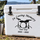 In Loving Memory drum set decal on white surface with drum icon and “Your Text” lines