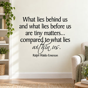Black quote wall decal: 'tiny matters' and 'within us' by Ralph Waldo Emerson.