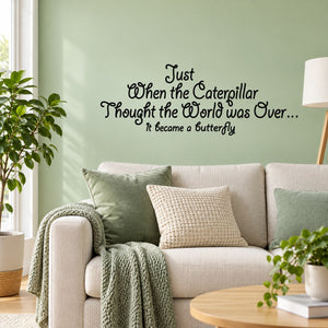 Butterfly wall decal with cursive quote text: “Just when the caterpillar...”