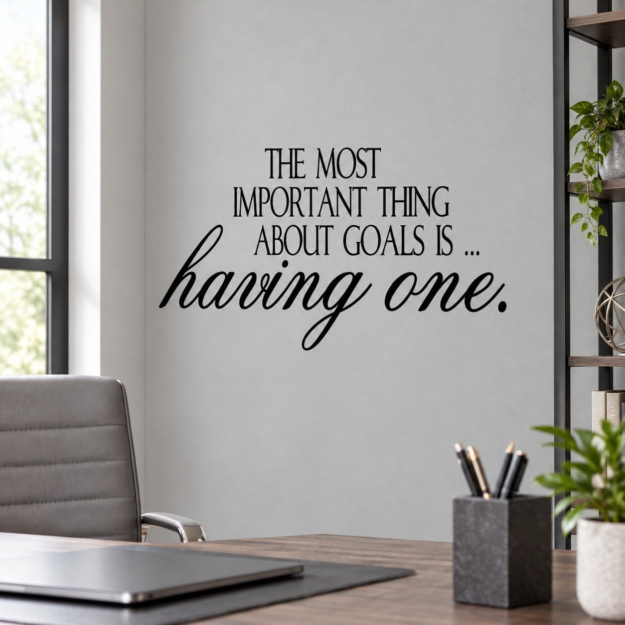 Wall decal quote: "THE MOST IMPORTANT THING ABOUT GOALS IS... having one."