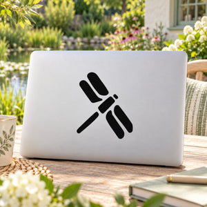 Simple dragonfly decal sticker, black icon on light laptop lid