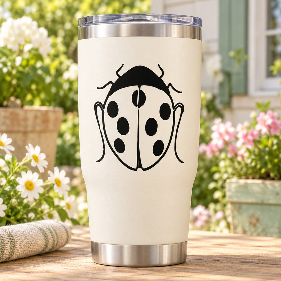 Ladybug decal on cream tumbler, black spots and antenna graphic