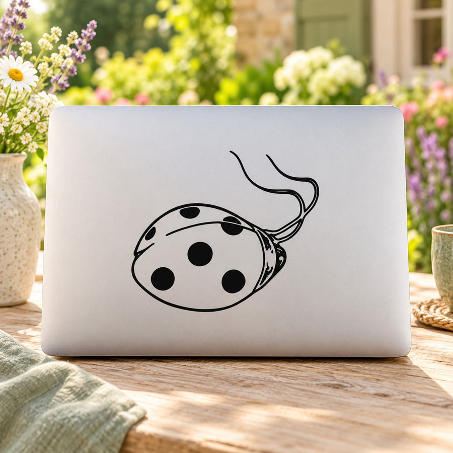 Ladybug decal sticker with black resting ladybug and antenna on white rectangle