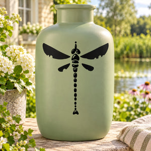 Beaded dragonfly decal with black winged silhouette and bead-style center design