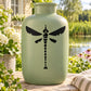 Beaded dragonfly decal with black winged silhouette and bead-style center design