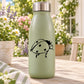 Mint green water bottle with black ladybug decal and stainless lid