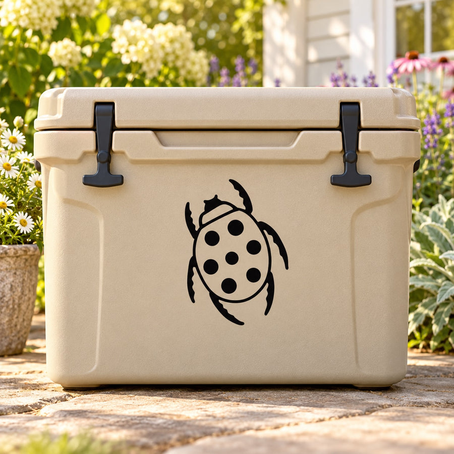 Ladybug decal with black-and-white spots on a beige cooler