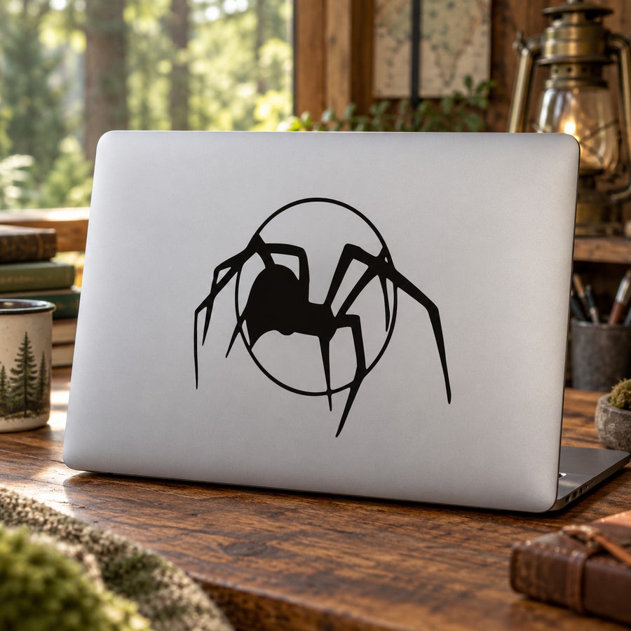 Black spider decal with circle design, vinyl-style sticker