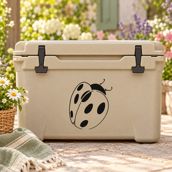 Hardy ladybug decal on a beige cooler: black ladybug with spots and antennae