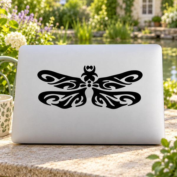 Dragonfly wing swirl decal in black on white rectangular surface