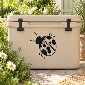 Ladybug decal sticker: black ladybug with white spots on light surface