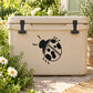 Ladybug decal sticker: black ladybug with white spots on light surface