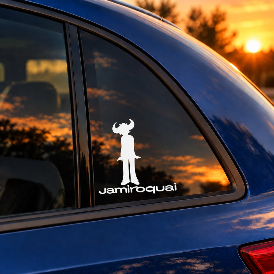 Jamiroquai logo text car window decal, white silhouette and lettering on dark glass