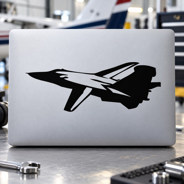 Black fighter jet silhouette decal on a light background
