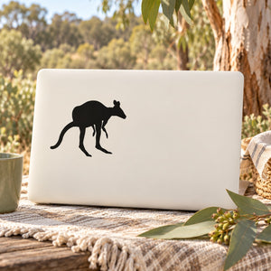 Squatting kangaroo decal sticker, black silhouette on light rectangular backing.