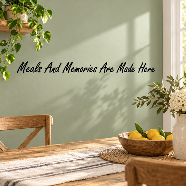 Wall decal with cursive text "Meals And Memories Are Made Here"