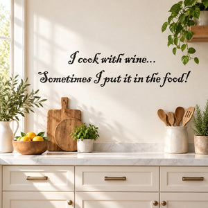 Wall decal with black script text: 'I cook with wine... Sometimes I put it in the food!'