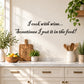 Wall decal with black script text: 'I cook with wine... Sometimes I put it in the food!'