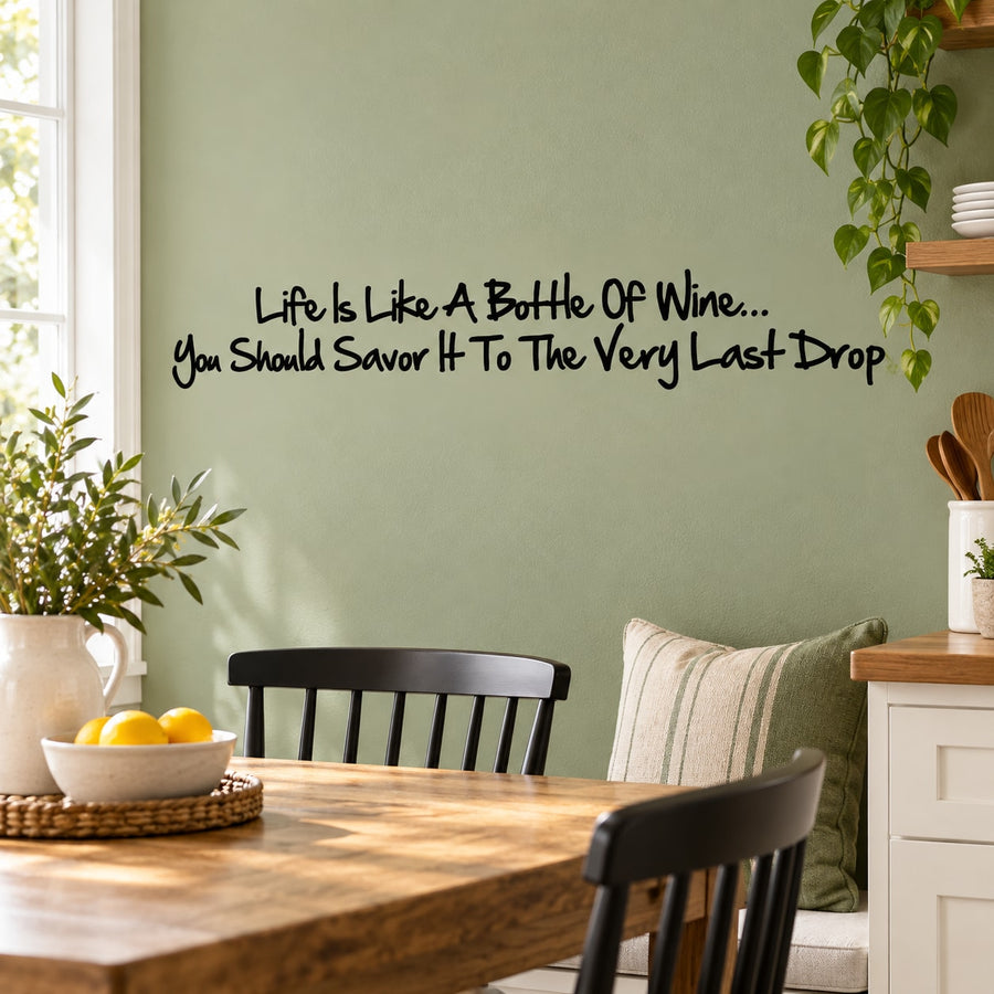 Wall decal with black script quote: Life is like a bottle of wine, savor to the last drop