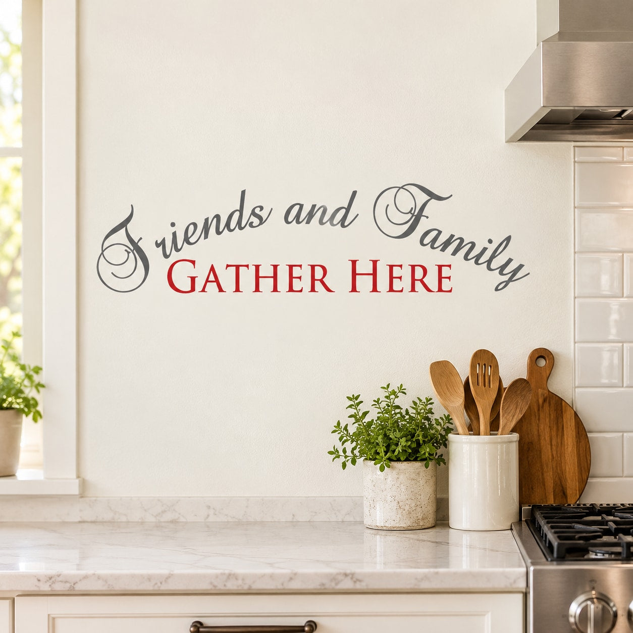 Wall decal reading "Friends and Family" and red "GATHER HERE"