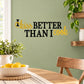 Kitchen wall decal with orange script "Kiss" and black "BETTER THAN I COOK"