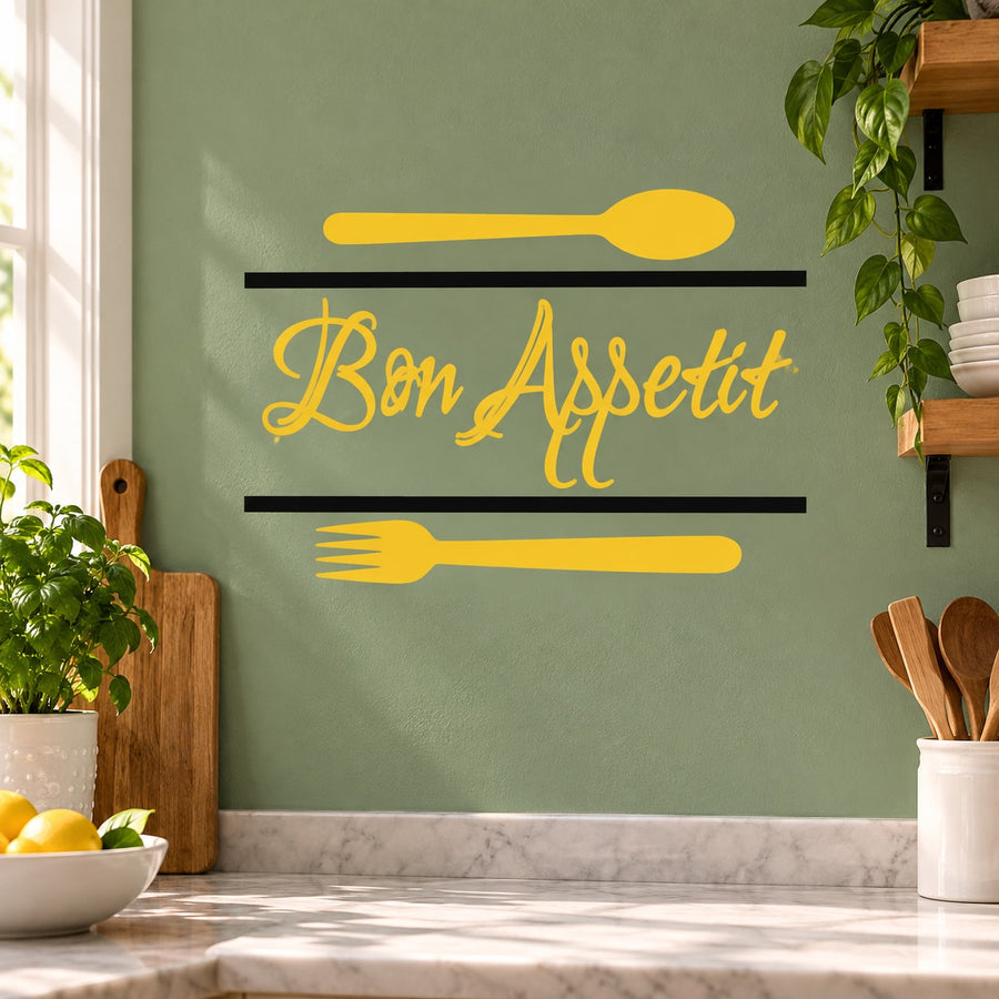 Wall decal with yellow spoon, fork, and Bon Appetit cursive lettering