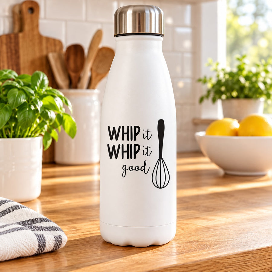 White drink tumbler with “WHIP it good” lettering and whisk icon